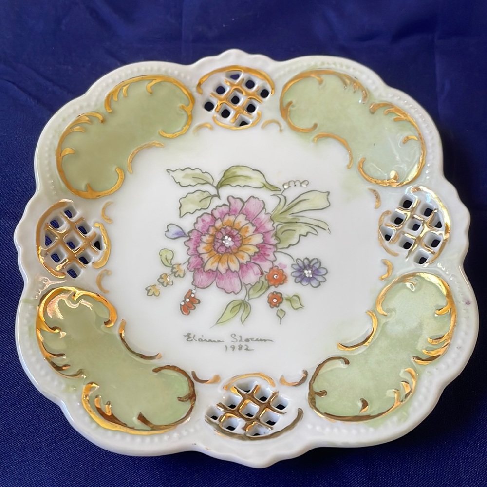 Pretty hand painted pierced porcelain small plate trinket
